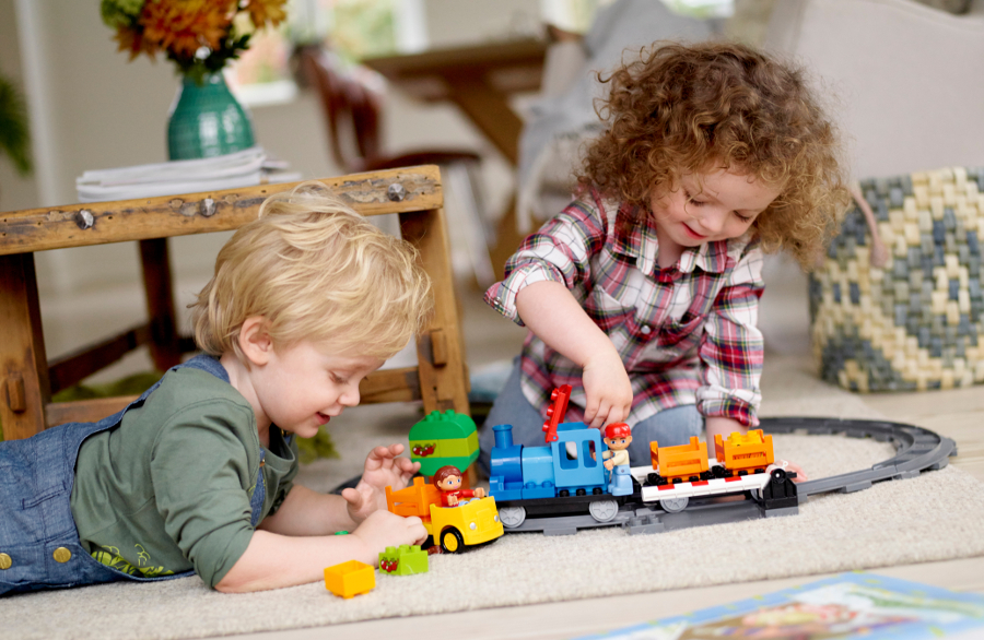 kids playing duplo train lego